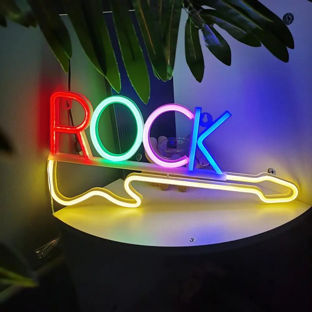 insegna al neon a led sul muro - chitarra rock