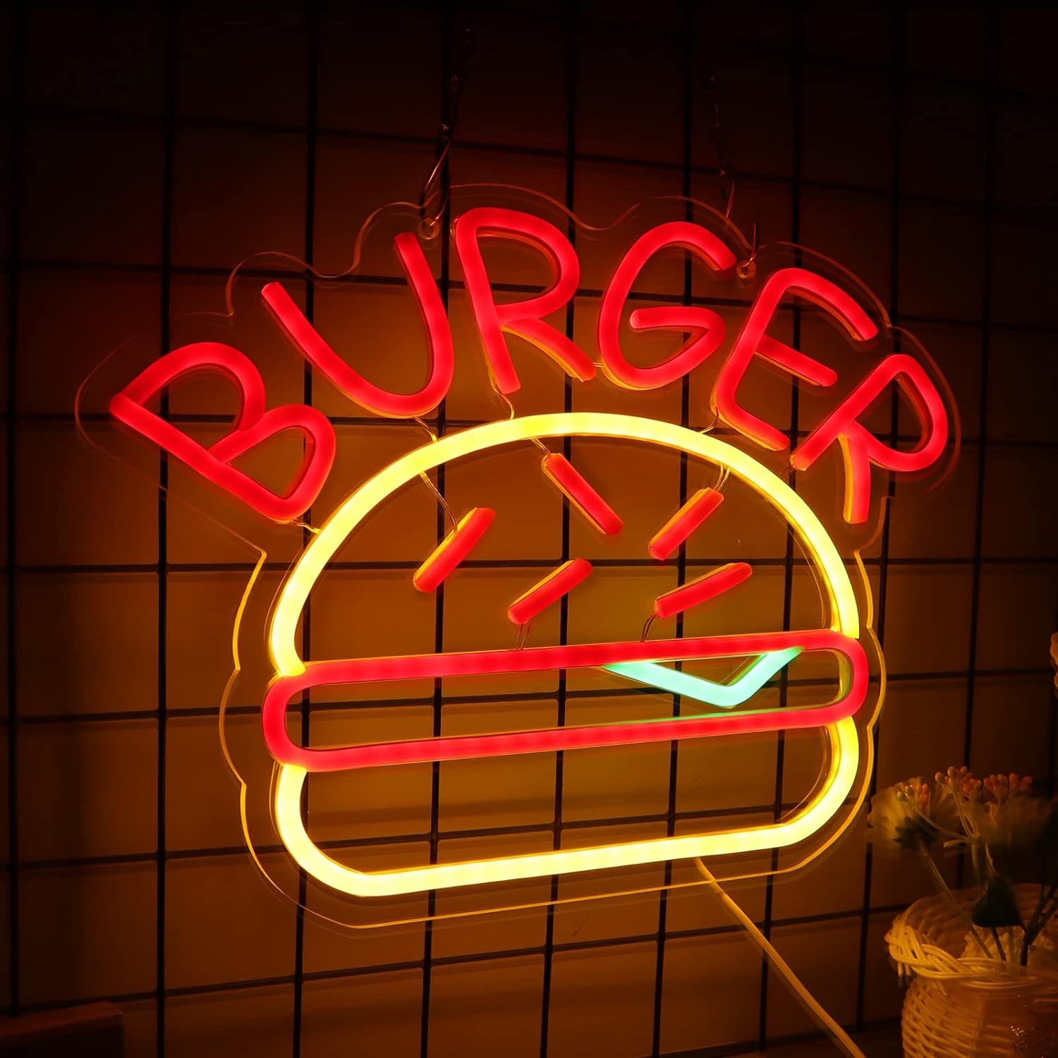 logo dell'insegna al neon di illuminazione dell'hamburger sulla parete